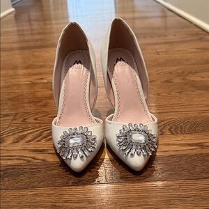 Madison White Pointed-Toe Pumps with Crystal Brooch